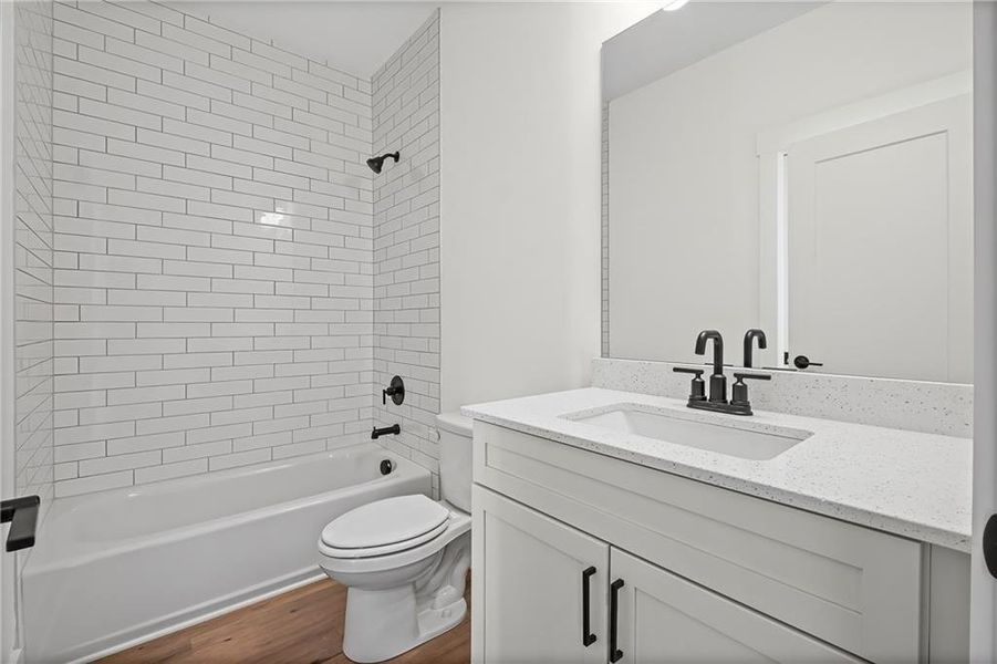 Furnished interior view inside a new home in Devin's Shire - A Kennesaw Tradition, Kennesaw (Image 10).