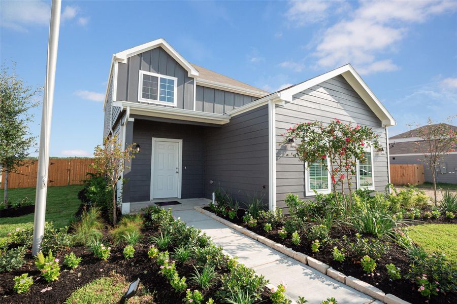 Front exterior of a new home in Wayside Village, Houston, TX, highlighting curb appeal (Image 2). Front exterior of a new home in Wayside Village, Houston, TX, highlighting curb appeal (Image 2).
