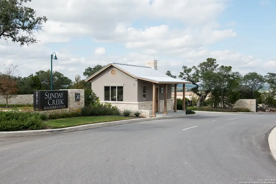 Front exterior of a new home in Sunday Creek at Kinder Ranch, San Antonio, TX, highlighting curb appeal (Image 11). Front exterior of a new home in Sunday Creek at Kinder Ranch, San Antonio, TX, highlighting curb appeal (Image 11).