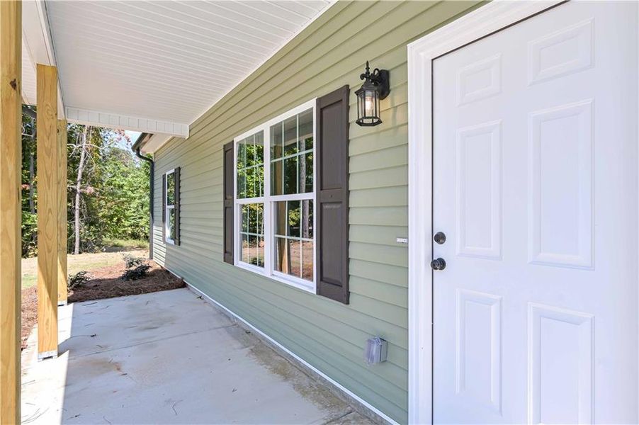 Front exterior of a new home in , Temple, GA, highlighting curb appeal (Image 18).