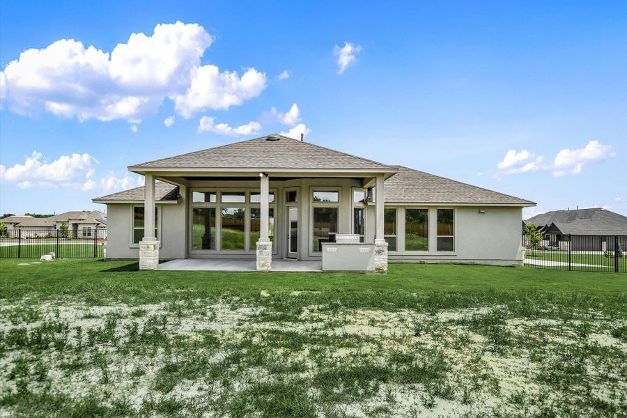 Exterior details and patio area of a home in Scofield Farms Estates, Georgetown (Image 22).