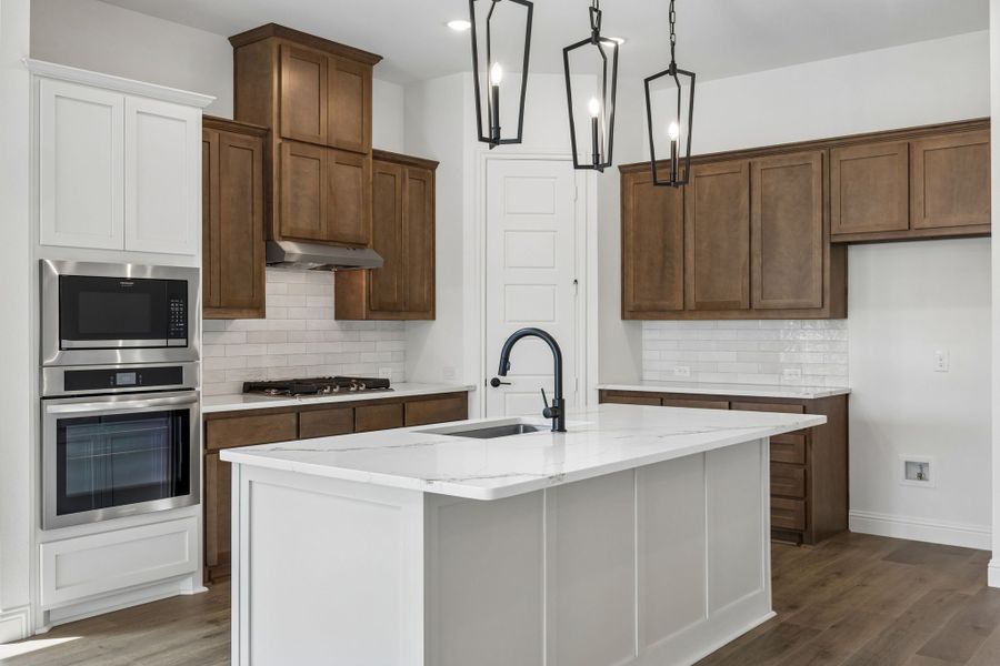 Furnished interior view inside a new home in Country Lakes, Denton (Image 11).