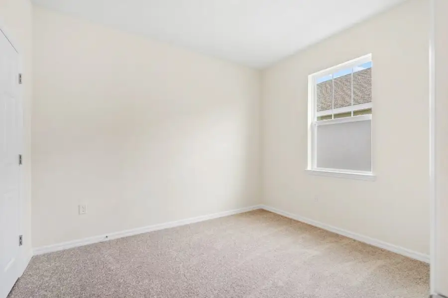 Representative unfurnished interior of a home built from the Beverly by Holiday Builders in Eden Hills, Lake Alfred (Image 15).