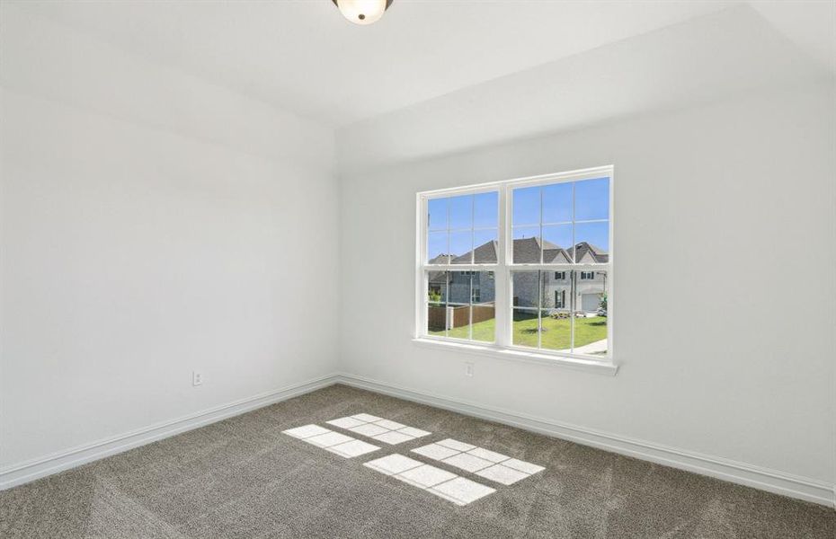 Secondary bedroom with ample closer space *real home pictured