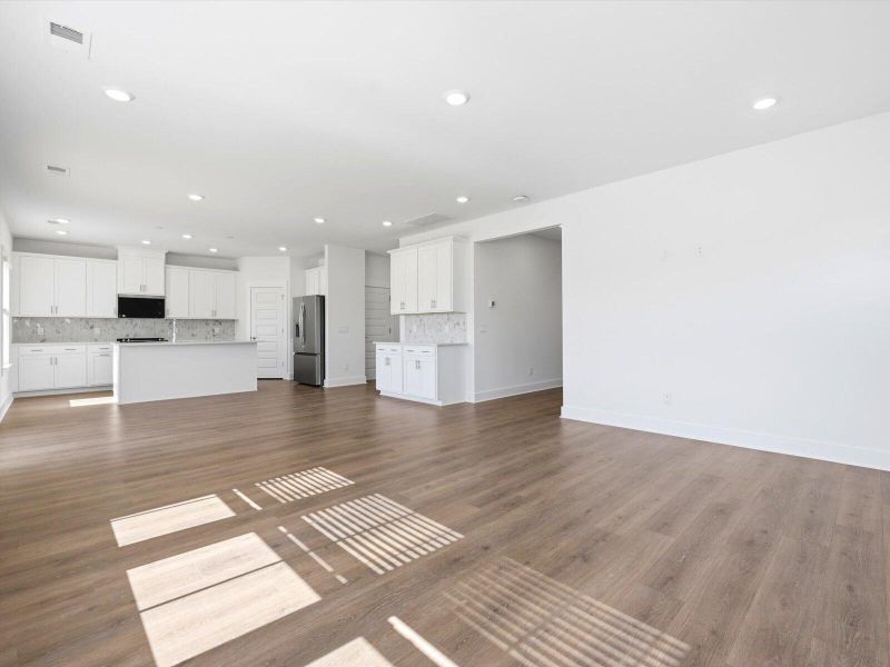 Spacious, unfurnished interior of a new home in The Coves at Lakes of Cane Bay II, Summerville (Image 25). Spacious, unfurnished interior of a new home in The Coves at Lakes of Cane Bay II, Summerville (Image 25).