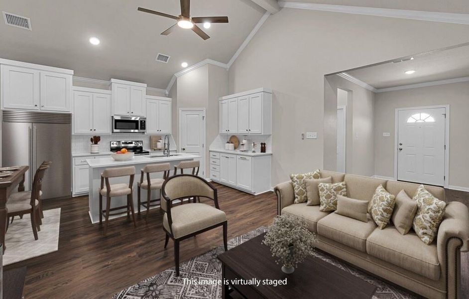 Living area with ornamental molding, dark wood finished floors, ceiling fan, high vaulted ceiling, and recessed lighting