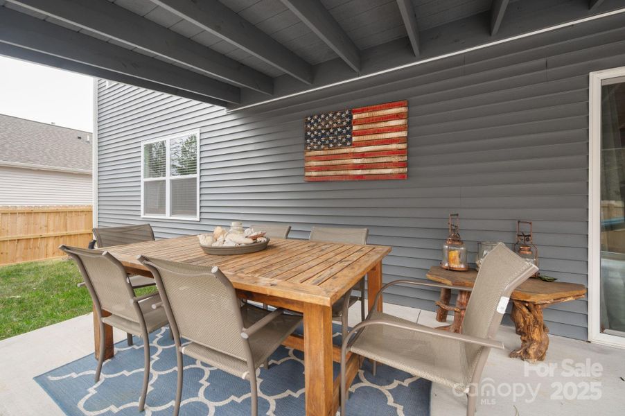 Exterior details and patio area of a home in , Fletcher (Image 30).