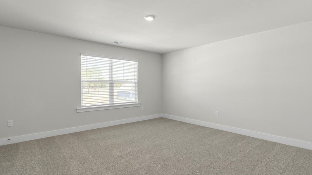 Spacious, unfurnished interior of a new home in Surfside Landing, Hubert (Image 42).