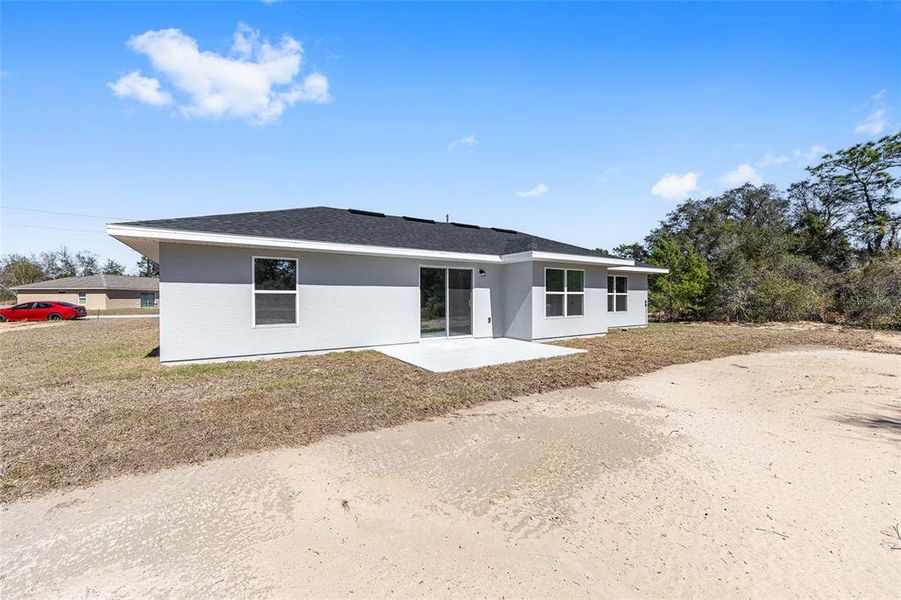 Exterior details and patio area of a home in , Ocala (Image 24).