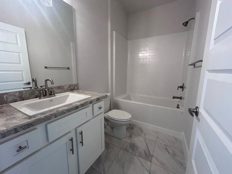 Furnished interior view inside a new home in Waterstone 52, Fort Pierce (Image 5).