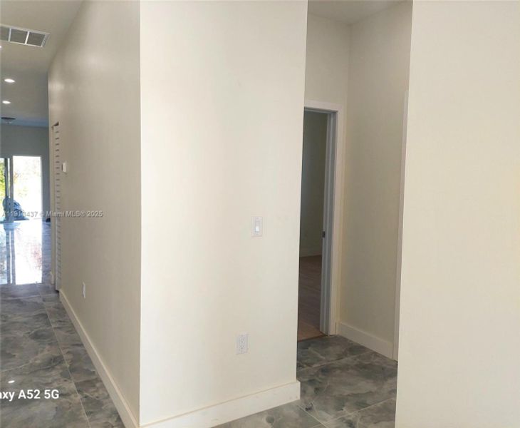 Spacious, unfurnished interior of a new home in , Port Charlotte (Image 24).