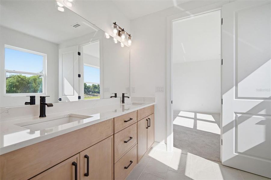 Furnished interior view inside a new home in Fieldstone, Plant City (Image 11).