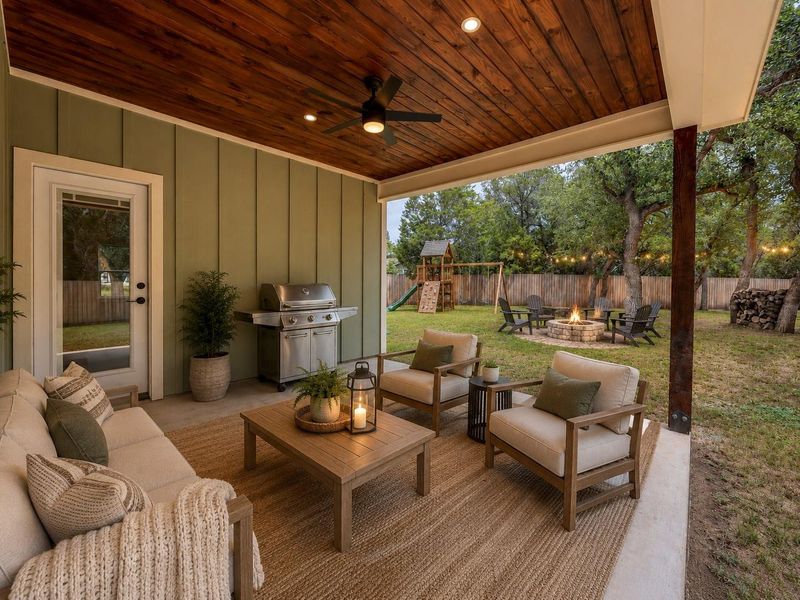 A welcoming patio extends to a spacious yard, featuring a fire pit and play area for diverse outdoor enjoyment. A welcoming patio extends to a spacious yard, featuring a fire pit and play area for diverse outdoor enjoyment.