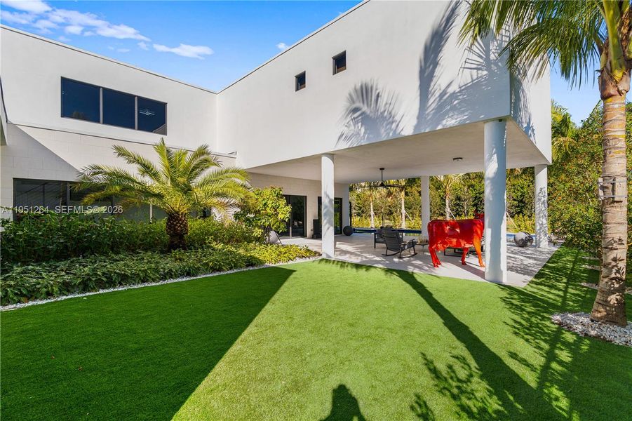 Exterior details and patio area of a home in , Weston (Image 35).