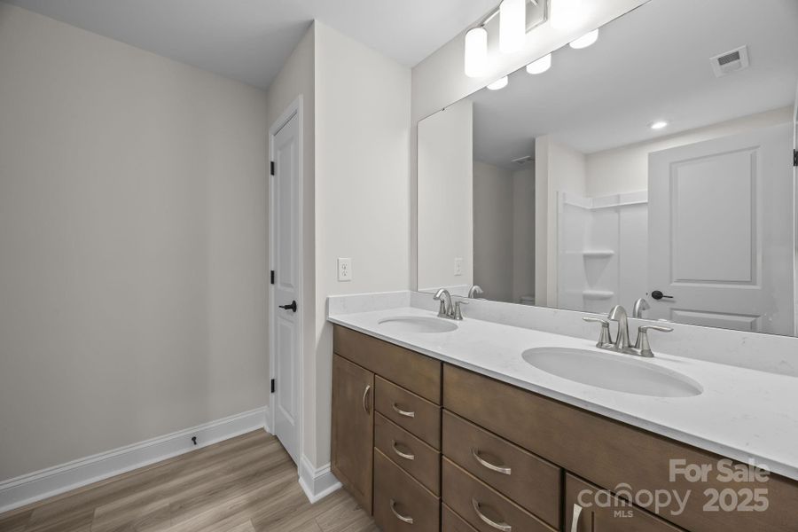 Furnished interior view inside a new home in Parkside Crossing, Charlotte (Image 28). Furnished interior view inside a new home in Parkside Crossing, Charlotte (Image 28).