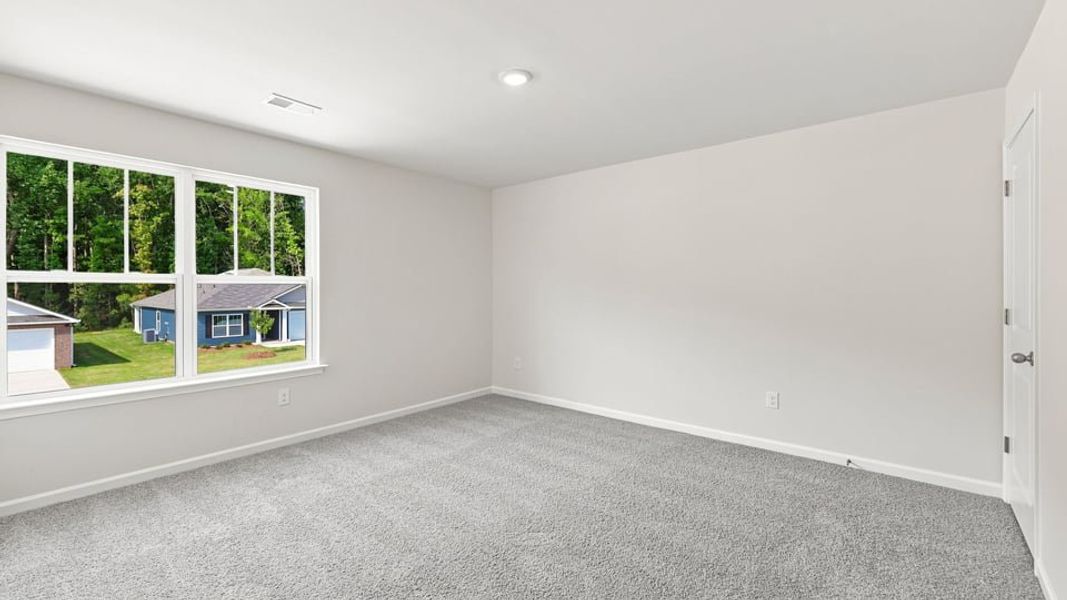 Spacious, unfurnished interior of a new home in Bentley Park, Greenwood (Image 27).
