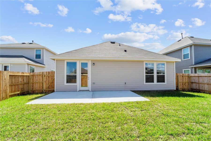 Come explore this generous backyard with large patio slab—perfect for kids to play freely and adults to unwind in comfort!