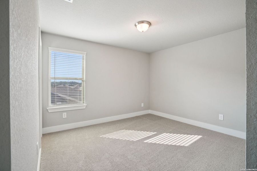 Spacious, unfurnished interior of a new home in Lark Canyon, New Braunfels (Image 52).