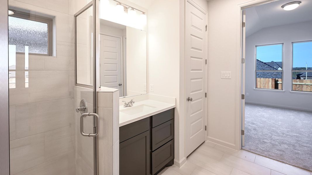 Furnished interior view inside a new home in Crosswinds, Kyle (Image 16).