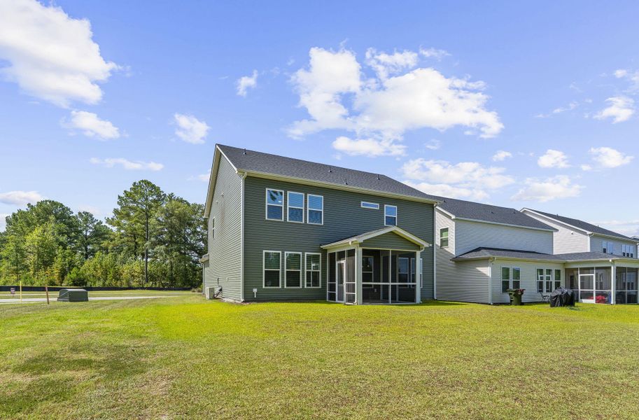 Exterior details and patio area of a home in The Groves of Berkeley, Moncks Corner (Image 29).