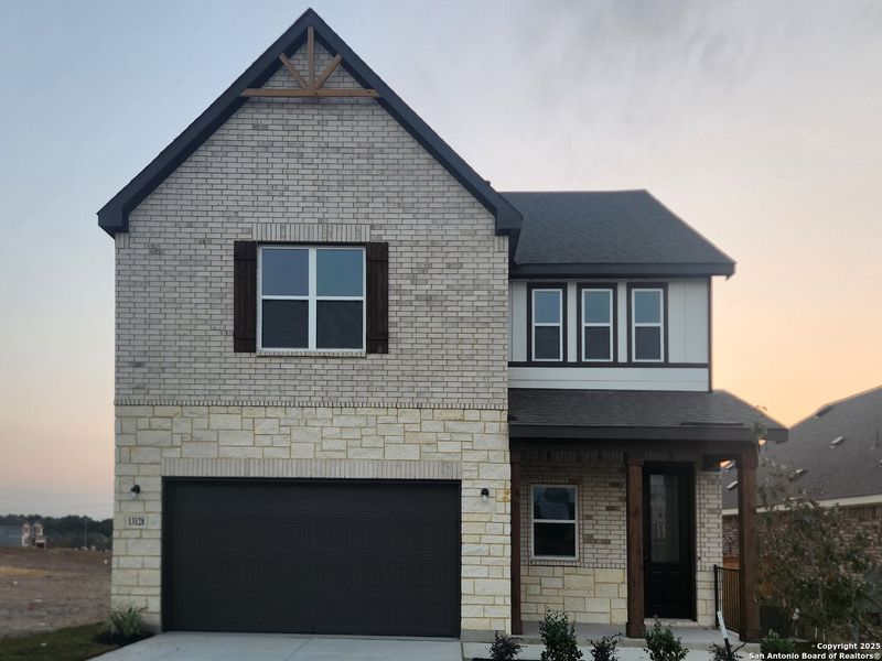 Front exterior of a new home in Arcadia Ridge, San Antonio, TX, highlighting curb appeal (Image 2).