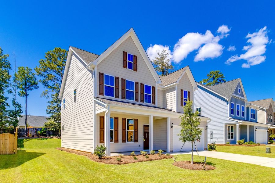 Front exterior of a new home in Pebble Branch, Chapin, SC, highlighting curb appeal (Image 21). Front exterior of a new home in Pebble Branch, Chapin, SC, highlighting curb appeal (Image 21).