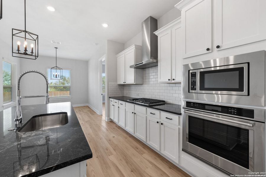 Furnished interior view inside a new home in Potranco West, Castroville (Image 5).