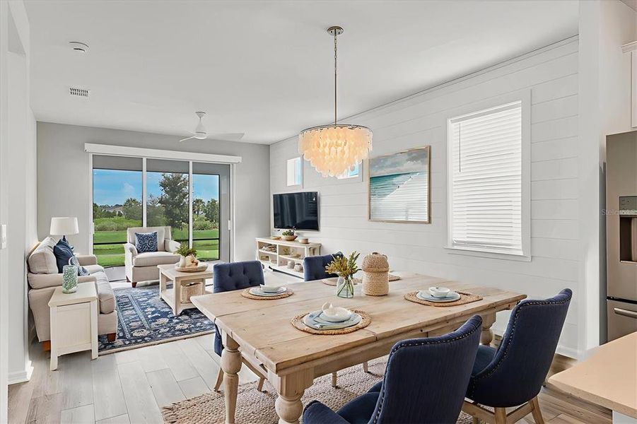 Virtual staging- what is top notch about this floorplan? Seating can be placed on either side of the room. Do notice the Shiplap wall in the Gathering room