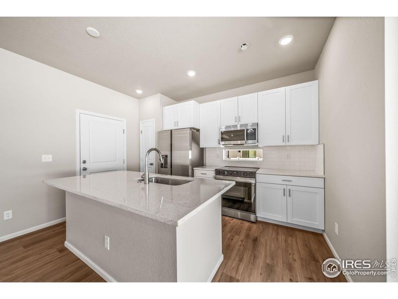 Furnished interior view inside a new home in Thompson River Ranch, Johnstown (Image 13).