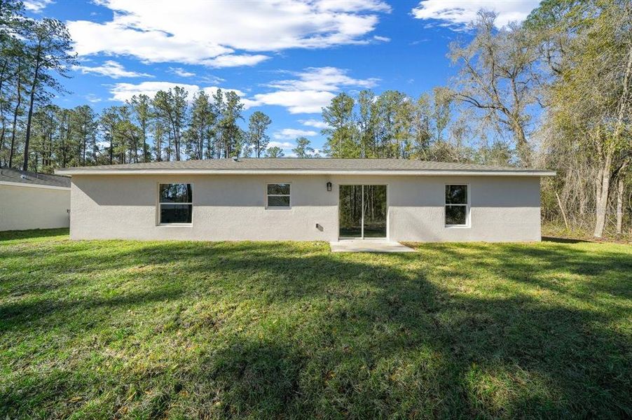 Exterior details and patio area of a home in , Citrus Springs (Image 20).