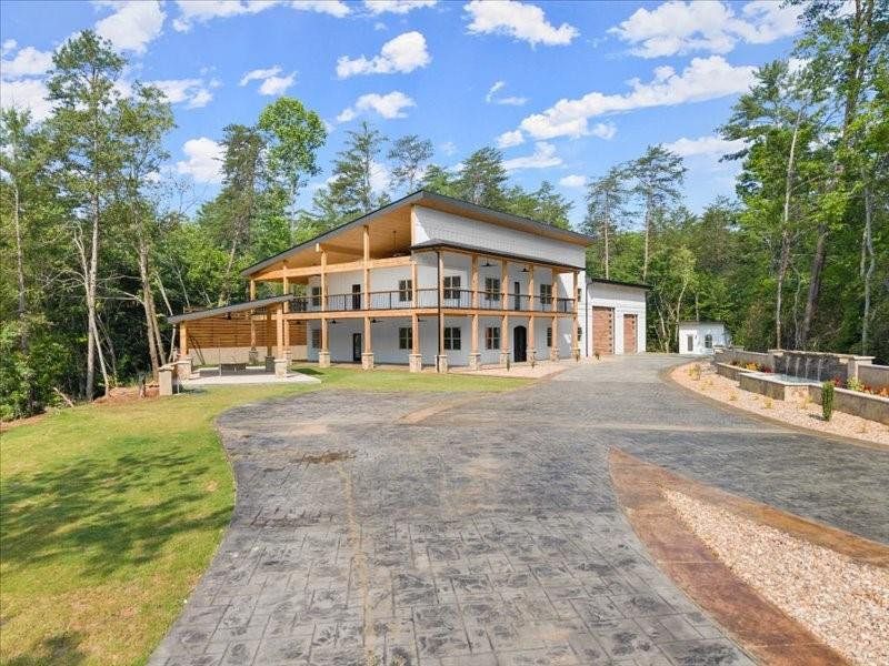 Front exterior of a new home in , Dahlonega, GA, highlighting curb appeal (Image 38).
