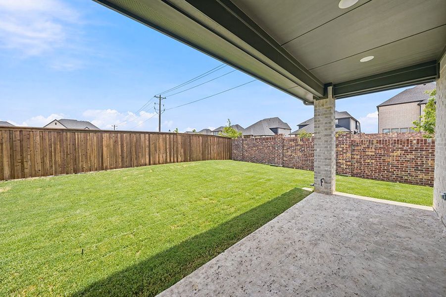 Exterior details and patio area of a home in Estates at Rockhill, Frisco (Image 3).