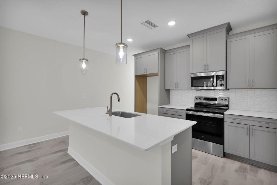 Furnished interior view inside a new home in Woodland Park, Nocatee (Image 6).