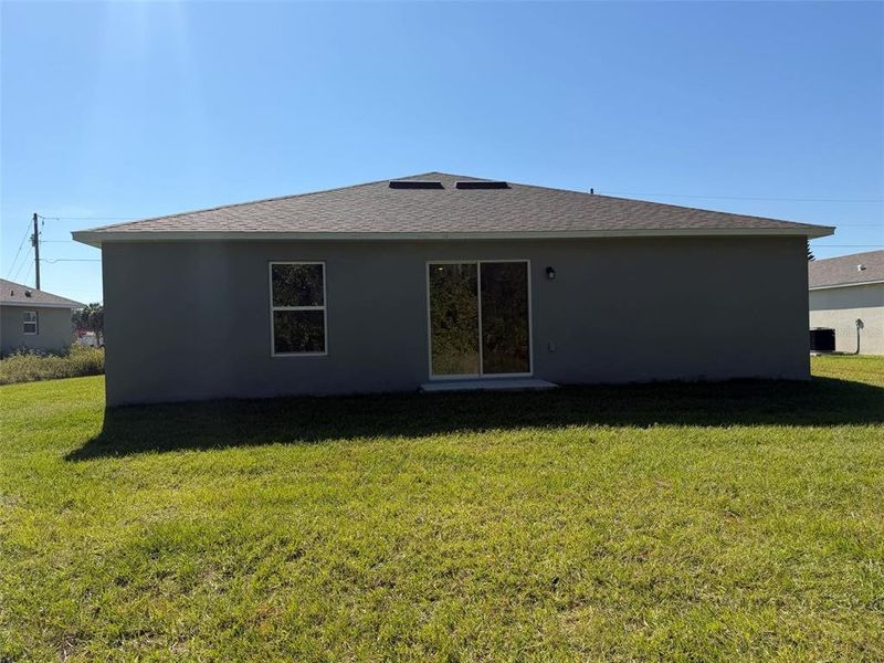 Exterior details and patio area of a home in , Poinciana (Image 2). Exterior details and patio area of a home in , Poinciana (Image 2).