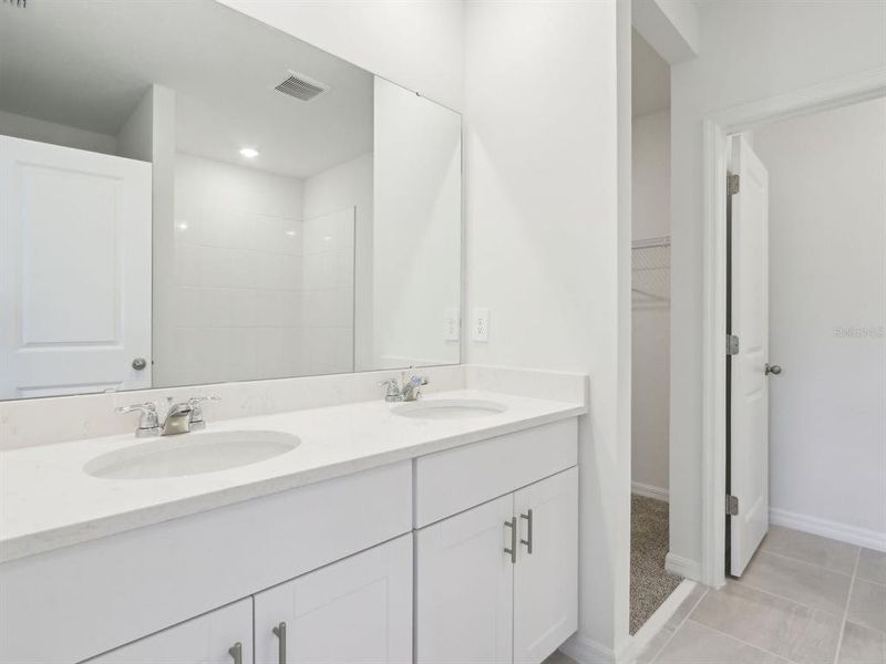 Furnished interior view inside a new home in The Reserve at Van Oaks, Auburndale (Image 9).