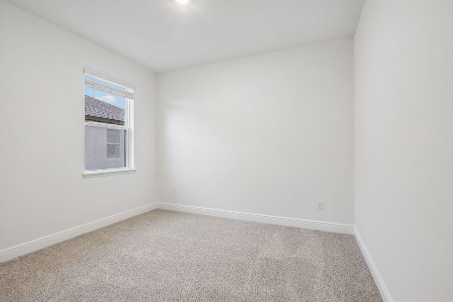 Spacious, unfurnished interior of a new home in Legends Preserve - Signature Series, Daytona Beach (Image 18).