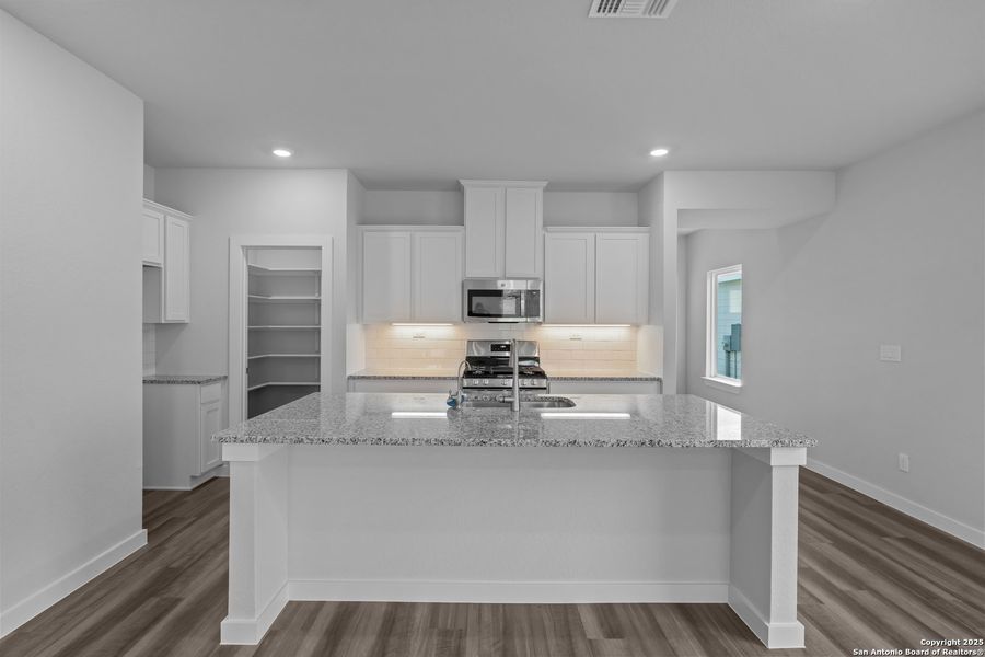 Furnished interior view inside a new home in The Meadows at Hunters Ranch, San Antonio (Image 5).