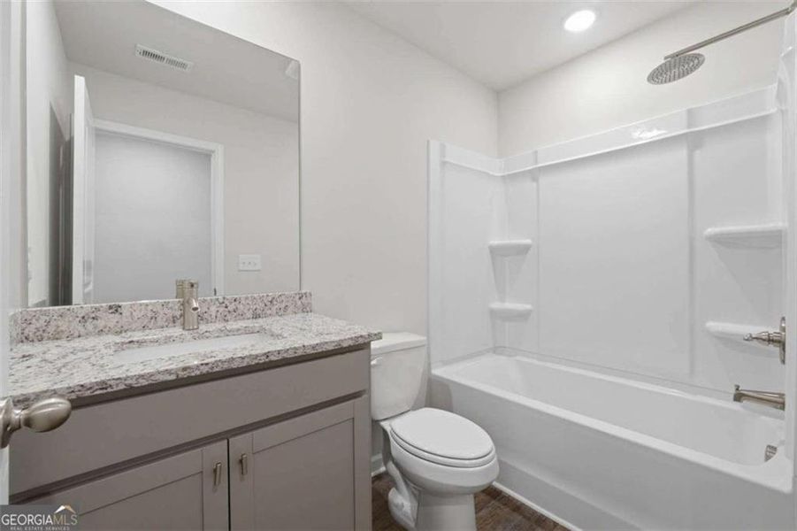Furnished interior view inside a new home in The Grove At Mundy Mill, Gainesville (Image 5).