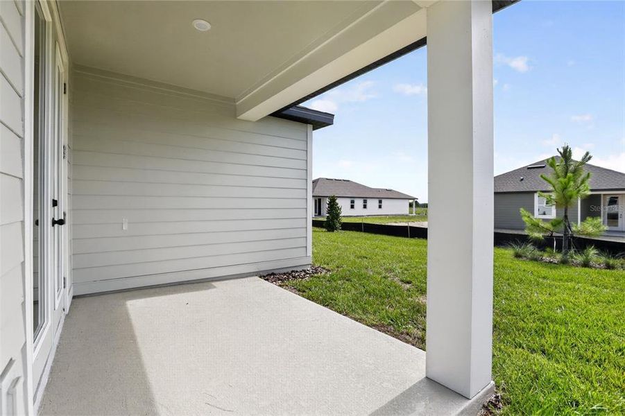 Exterior details and patio area of a home in Trailside, Mount Dora (Image 17). Exterior details and patio area of a home in Trailside, Mount Dora (Image 17).