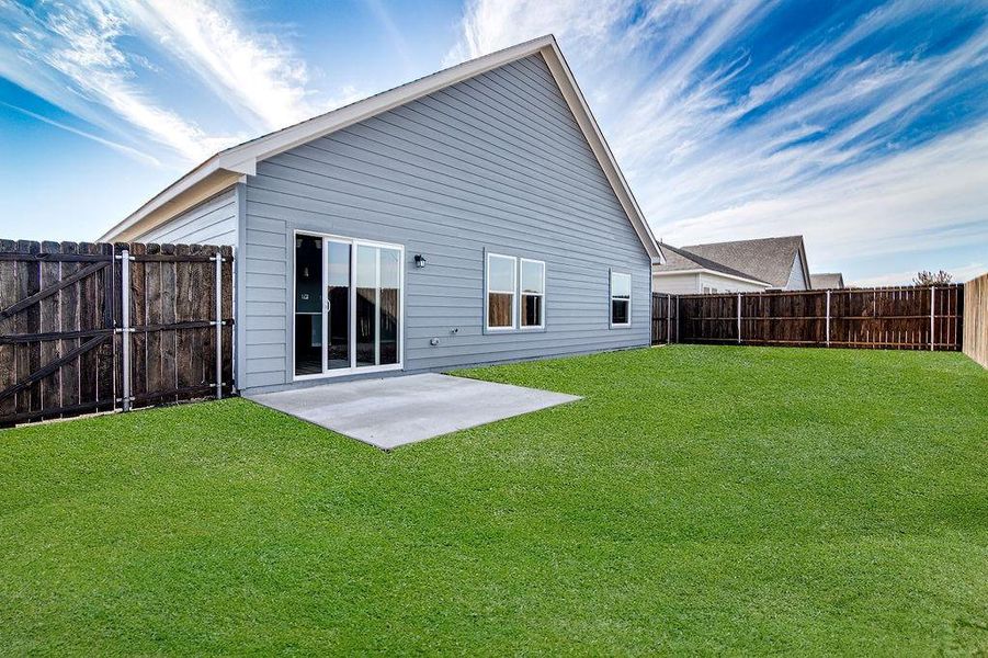 Exterior details and patio area of a home in Trails of Fossil Creek, Fort Worth (Image 3).
