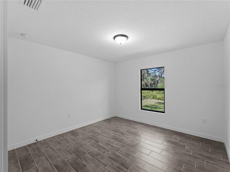 Spacious, unfurnished interior of a new home in , Port Charlotte (Image 12). Spacious, unfurnished interior of a new home in , Port Charlotte (Image 12).