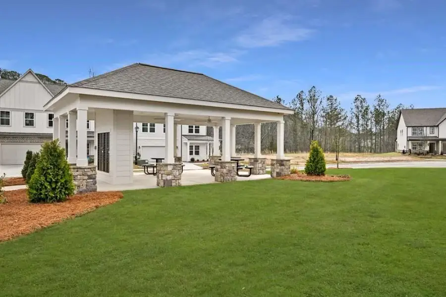 Exterior details and patio area of a home in Arbors at Richland Creek, Buford (Image 4).
