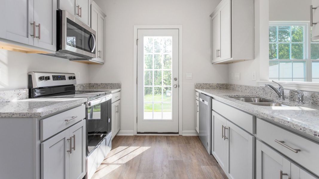 Furnished interior view inside a new home in Henley Ridge, Graham (Image 3).