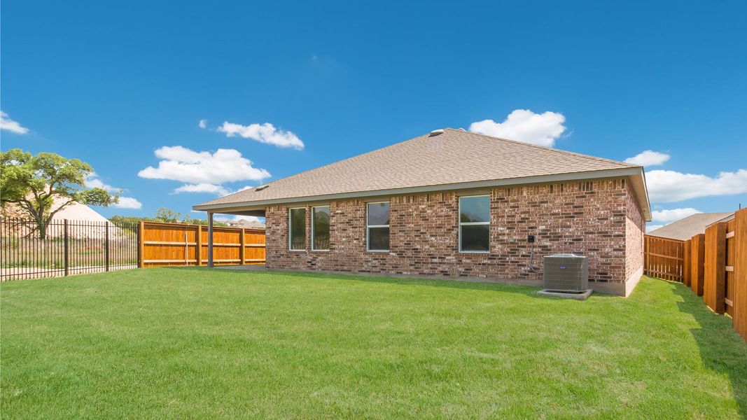 Front exterior of a new home in Riverview, Georgetown, TX, highlighting curb appeal (Image 2). Front exterior of a new home in Riverview, Georgetown, TX, highlighting curb appeal (Image 2).