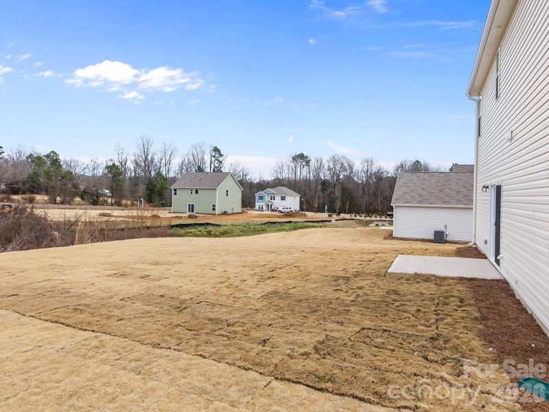 Exterior details and patio area of a home in Fisher Springs, Kannapolis (Image 4).