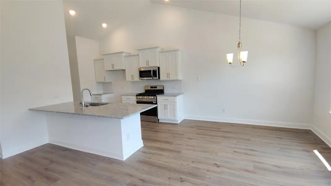 Furnished interior view inside a new home in Greystone, Angleton (Image 4).