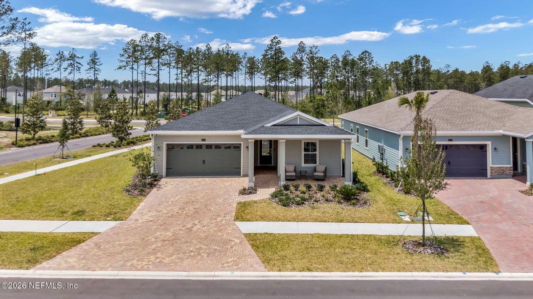 Front exterior of a new home in Shearwater, St. Augustine, FL, highlighting curb appeal (Image 24). Front exterior of a new home in Shearwater, St. Augustine, FL, highlighting curb appeal (Image 24).