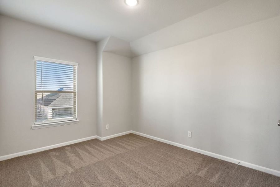 Bedroom in the Sapphire home plan by Trophy Signature Homes – REPRESENTATIVE PHOTO Bedroom in the Sapphire home plan by Trophy Signature Homes – REPRESENTATIVE PHOTO