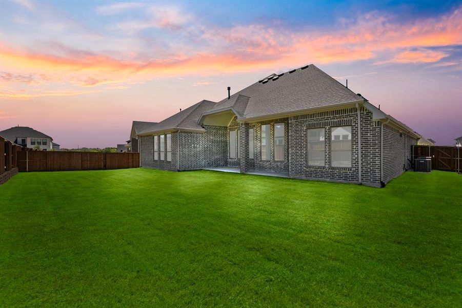 Front exterior of a new home in Windsong Ranch, Prosper, TX, highlighting curb appeal (Image 20). Front exterior of a new home in Windsong Ranch, Prosper, TX, highlighting curb appeal (Image 20).
