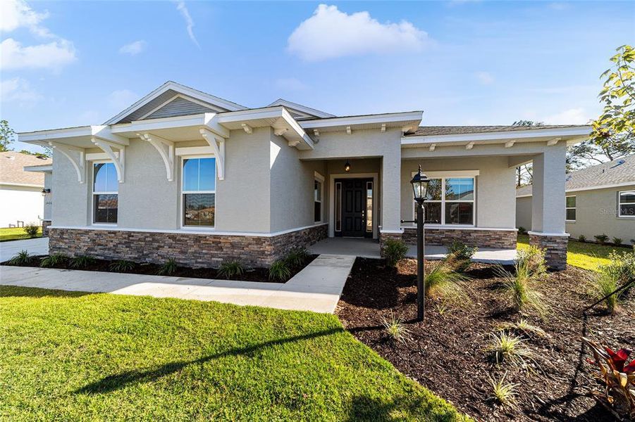 Front exterior of a new home in , Ocala, FL, highlighting curb appeal (Image 23). Front exterior of a new home in , Ocala, FL, highlighting curb appeal (Image 23).